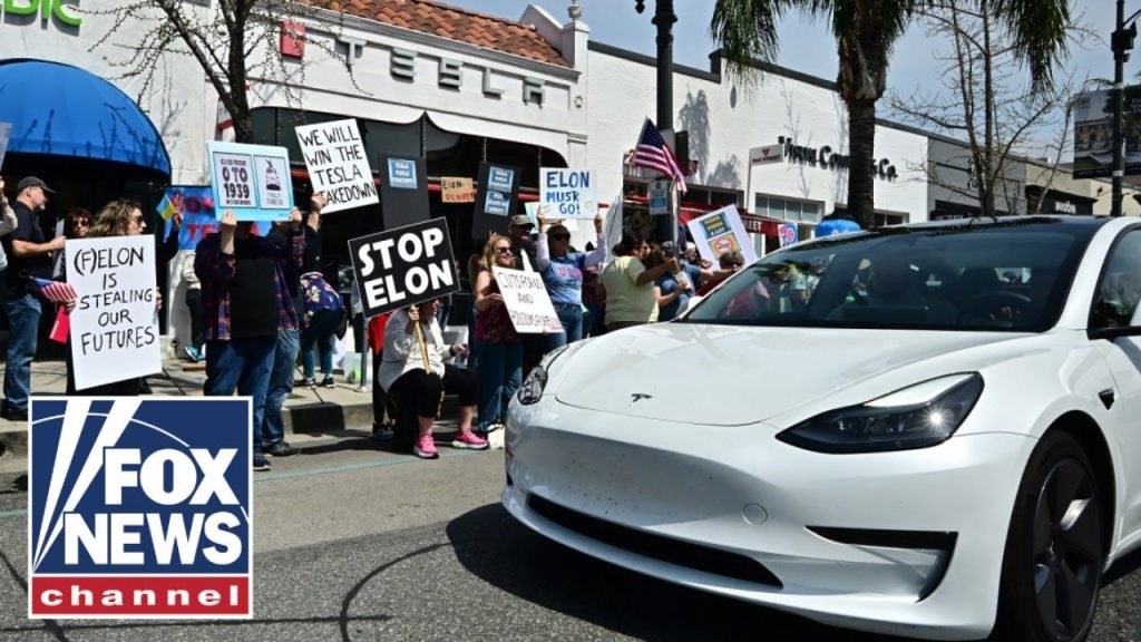 ‘DUMB’ AND ‘DANGEROUS’: Anti-Tesla rioters RAGE in nationwide ‘Tesla Takedown’